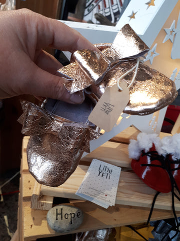 Rose gold leather moccs with bow