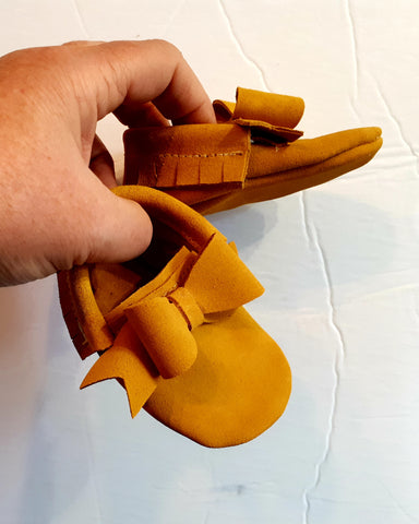 Mustard suede moccs with bow